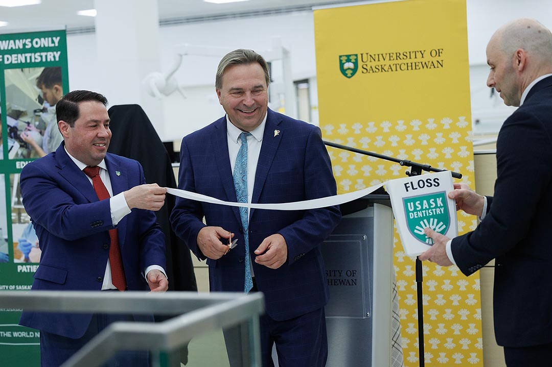 The Honourable Ken Cheveldayoff, Minister of Advanced Education, Dr. Walter Siqueira (DDS, PhD), Dean of the College of Dentistry, and Vince Bruni-Bossio, USask President and Vice-Chancellor at the official ribbon cutting to celebrate the crowning achievement for the university. (Photo: David Stobbe for the University of Saskatchewan)