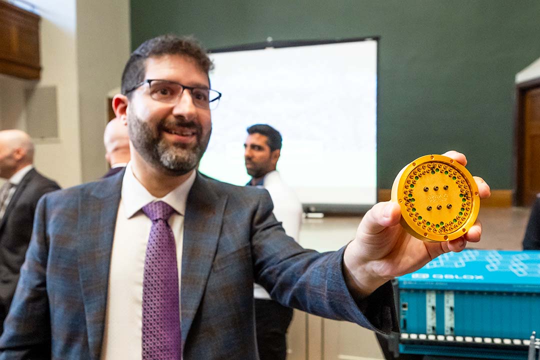 Dr. Steven Rayan (PhD) showcases the chip at the core of USask's first quantum computing system, a 9-qubit Novera™ QPU by Rigetti Computing, Inc.