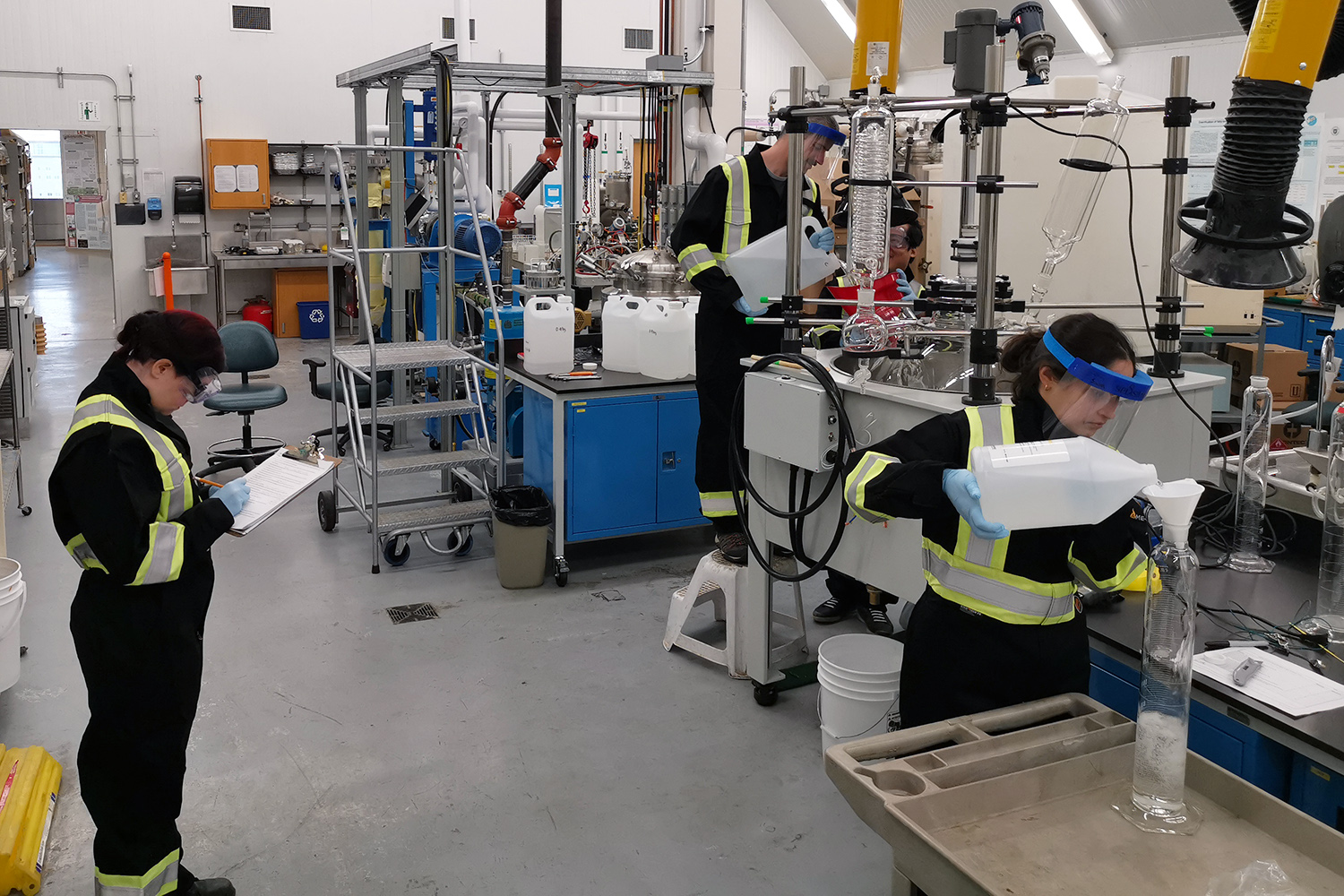 Researchers working at the USask Bioprocessing Pilot Plant. (Photo: University of Saskatchewan)
